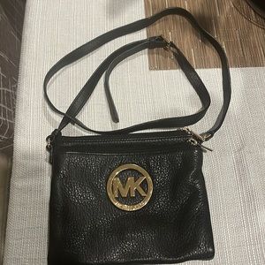 Micheal Kors crossbody mini bag.